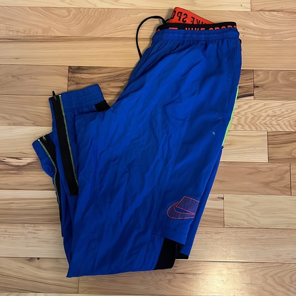 Blue Nike tech track suit pants. Worn about three times, - Picture 2 of 3
